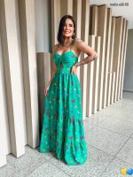 Este vestido verde é uma representação perfeita das últimas tendências da moda de 2023, oferecendo uma mistura irresistível de feminilidade, estilo e encanto. Com ele, você certamente atrairá olhares de admiração.